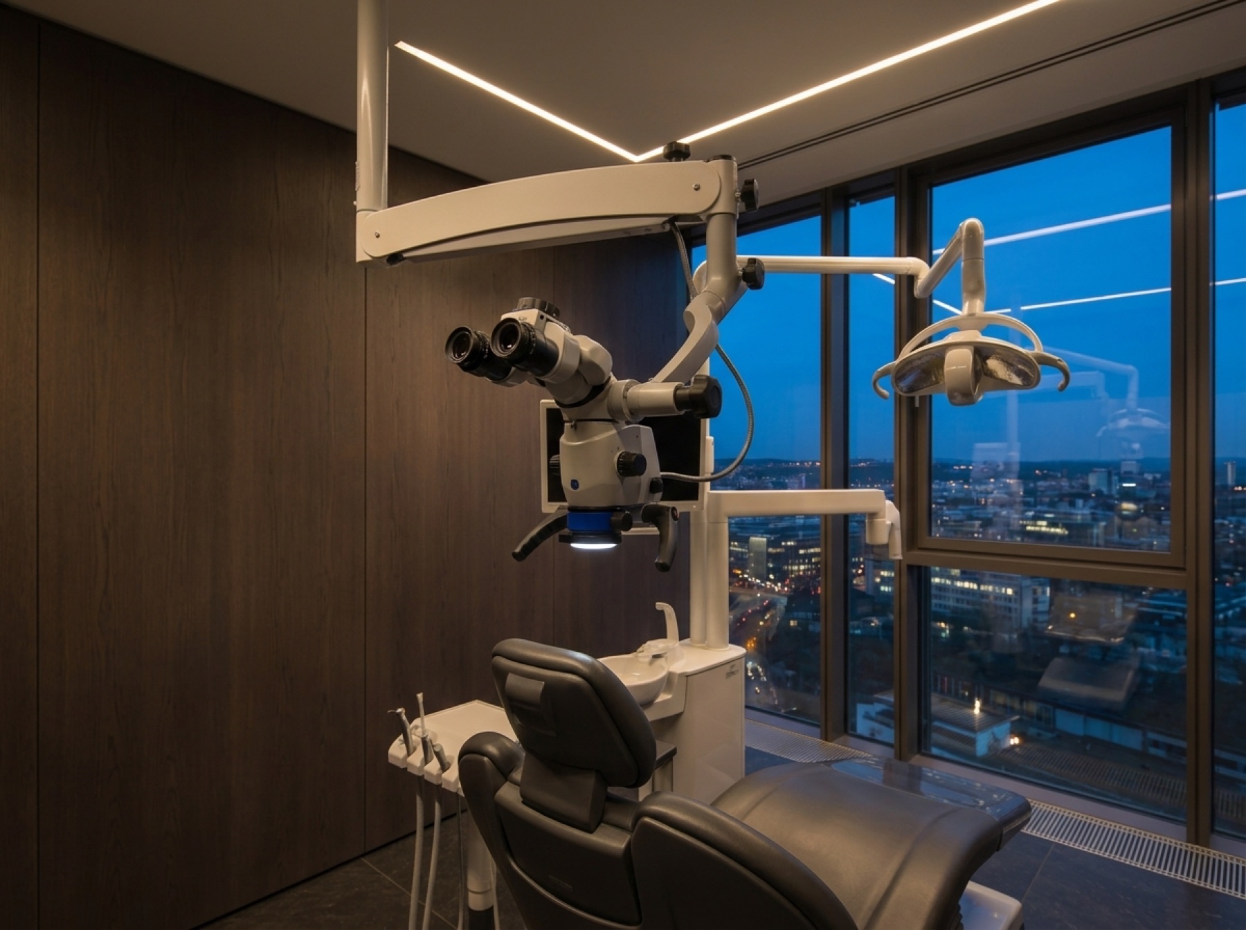 The surgical microscope above the chair.